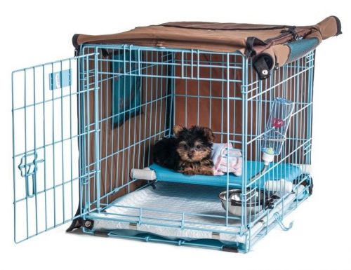 dog crate with bathroom area