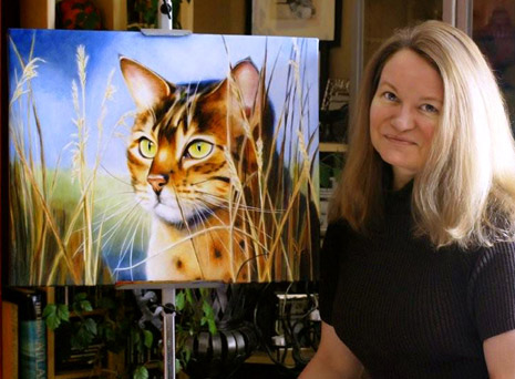 Denise Laurent is an animal portrait artist, specializing in feline portraiture.